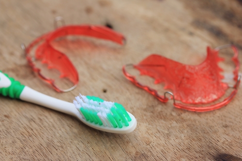 retainer and toothbrush