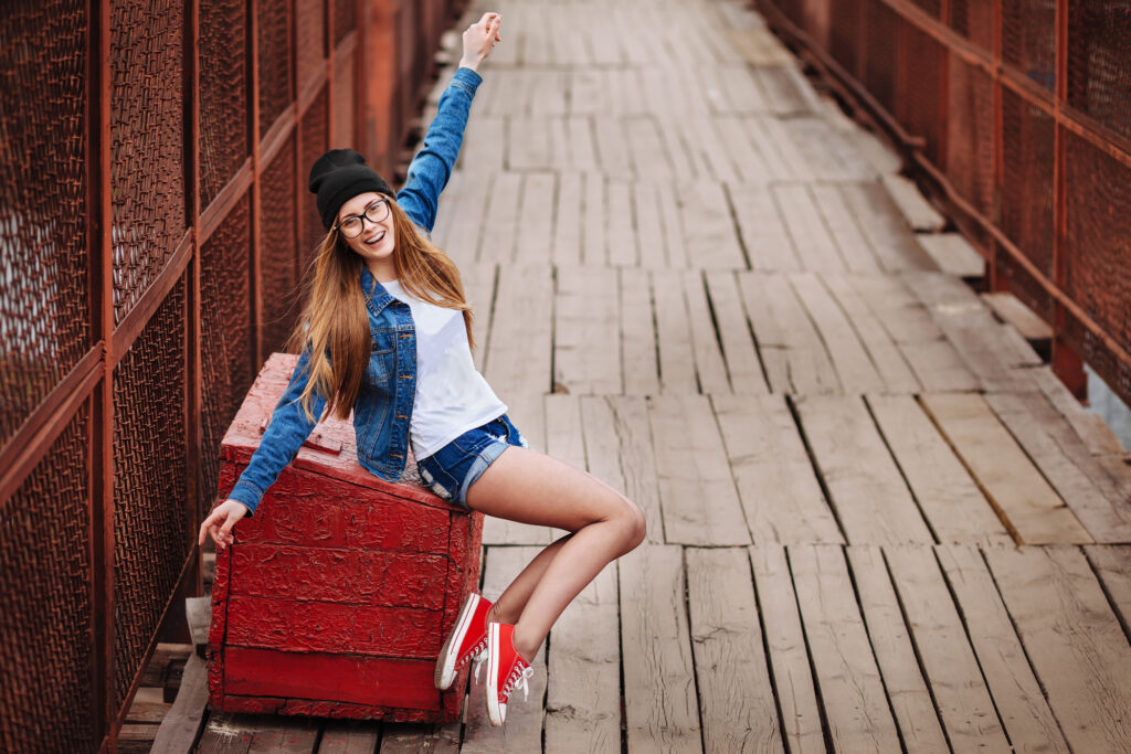 Young woman with braces taking a fun photo