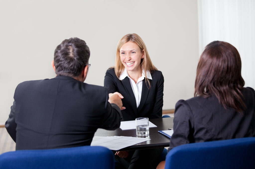 Confident young woman at a job interview. 