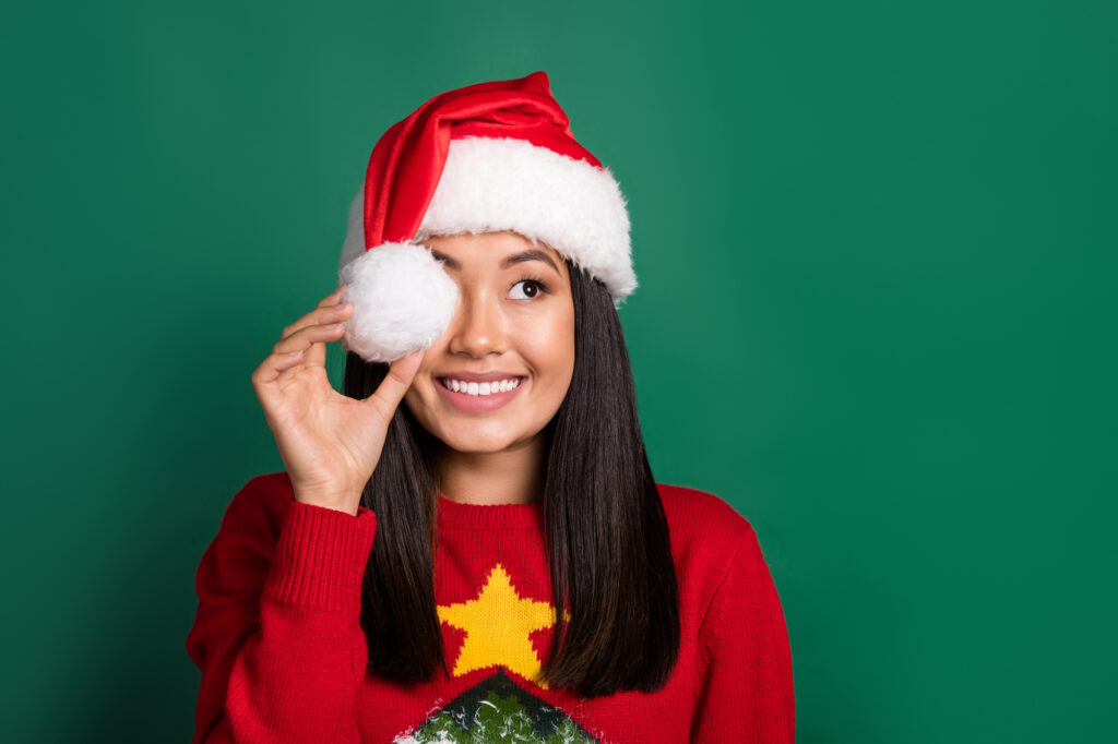 Woman with bright straight smile celebrating the holidays. 