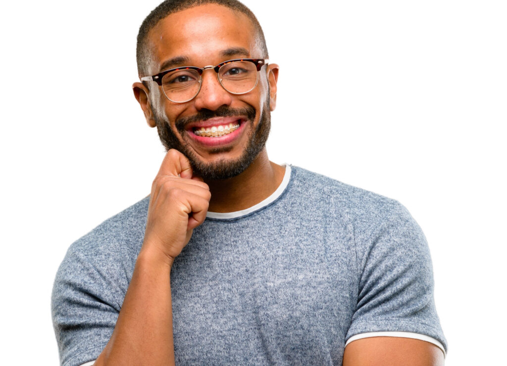 Adult man with clear braces. 