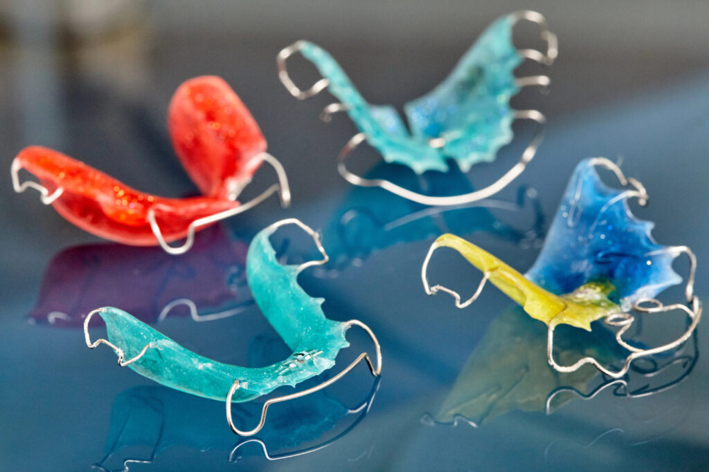 Colorful orthodontic retainers. 