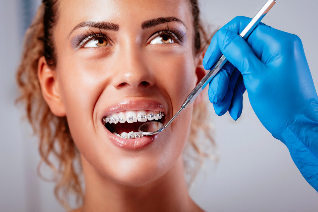 Young woman getting an braces exam